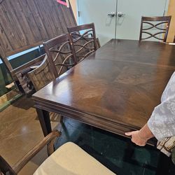 Table with 6 chairs for sale