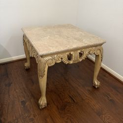 Carved wood and marble coffee table 