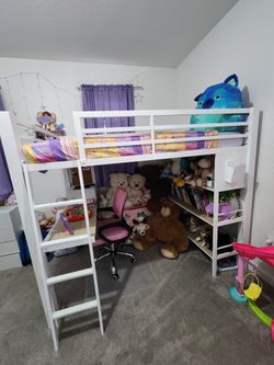 Bunk bed with desk and book shelves