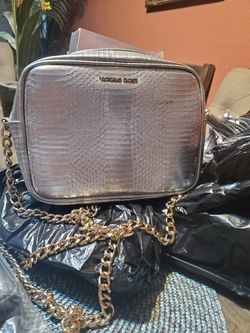 Victoria secret silver purse and new black Mary-Kay purse