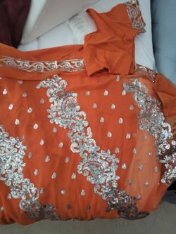 Saree's with shirt. Brand new never worn. Still in packaging. $40.00 each set. Med/large. 