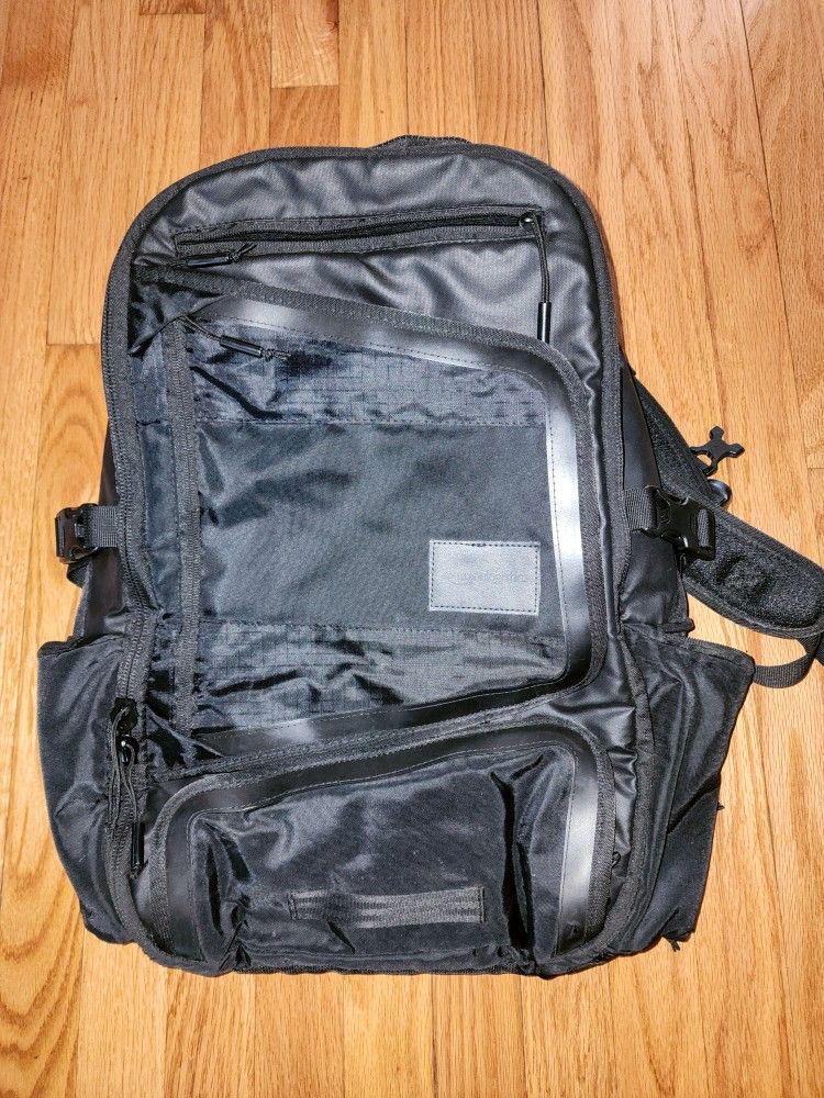 Cushioned Backpack with many zippered compartments 