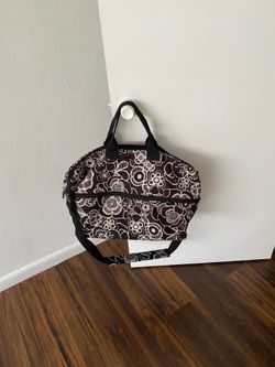 Traveler  multi -colored softside travel tote bag