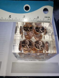 Acrylic penny cube paperweight