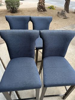 4 Counter Height Bar Stools.