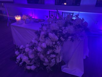 Stunning all white fresh floral waterfall - must pick up before Saturday.