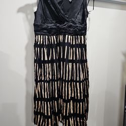 Cute black and gold dress size 12 payed $345  never been worn  im asking for $100