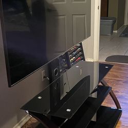 Glass Tv Mount/Entertainment Center.