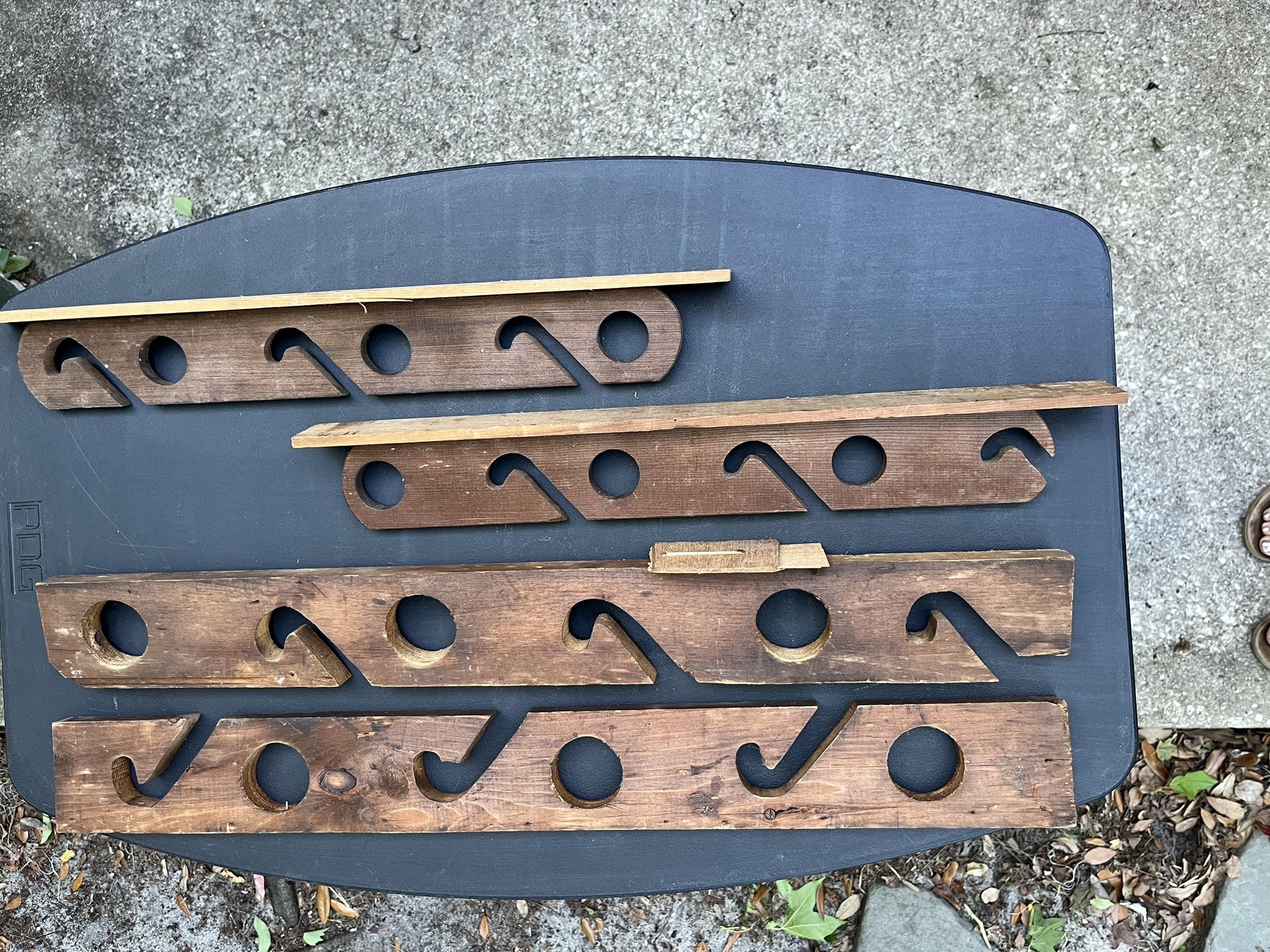 vintage handmade wooden fishing rod holders.  2 sets available $10 each set. 