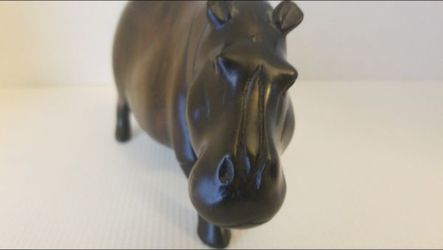 A hippopotamus carved by hand in woodA hippopotamus carved by hand in wood