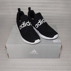 ADIDAS sneakers. Brand new in box. Black. Size 11.5 men's shoes Slip ons