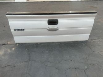 2009-2014 Ford F-150 tailgate with accessories OEM.