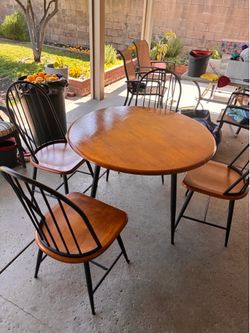 Wooden & Metal Table seats Four