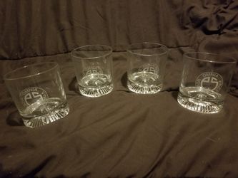 Set of four old fashioned drinking glasses