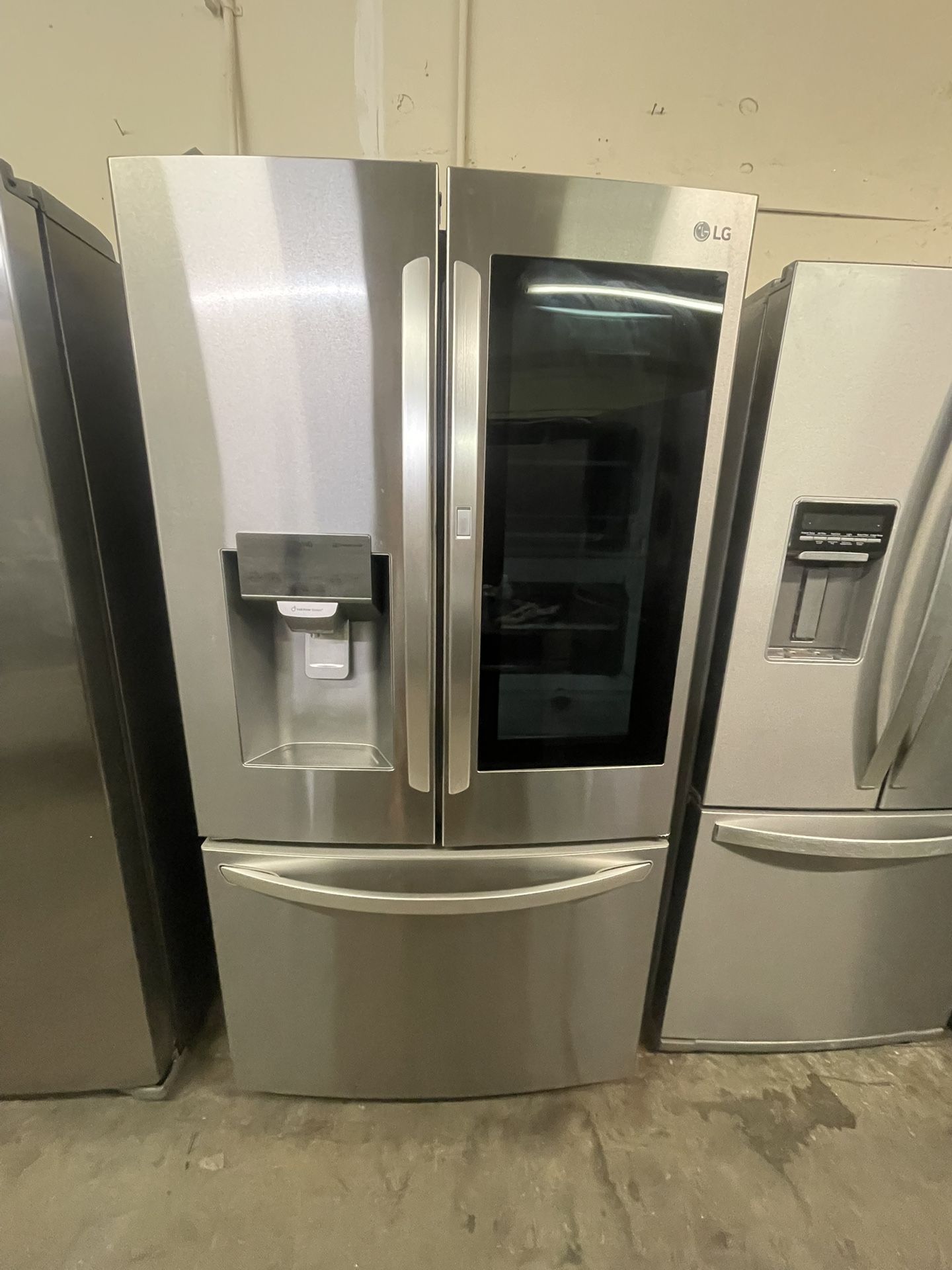 LG InstaView “Knock Knock” Smart Fridge – $850 OTD w/ Warranty