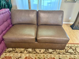 Tan Leather Armless Loveseat