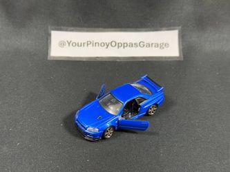 1/62 Takara Tomy Tomica Premium #11 - Blue Nissan Skyline R34 GT-R V-Spec II Nür (2014)