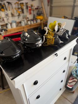 Hockey skates and helmets