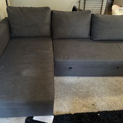 Sectional With Pull Out And Storage