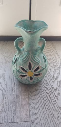 Teal Vase with a Flower Design