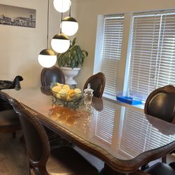 Heavy wood table set. 6 chairs included