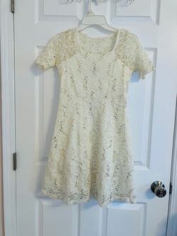 Openwork dress for girls with sequins and lining