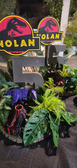 Dino Jurassic party centerpieces and backdrop