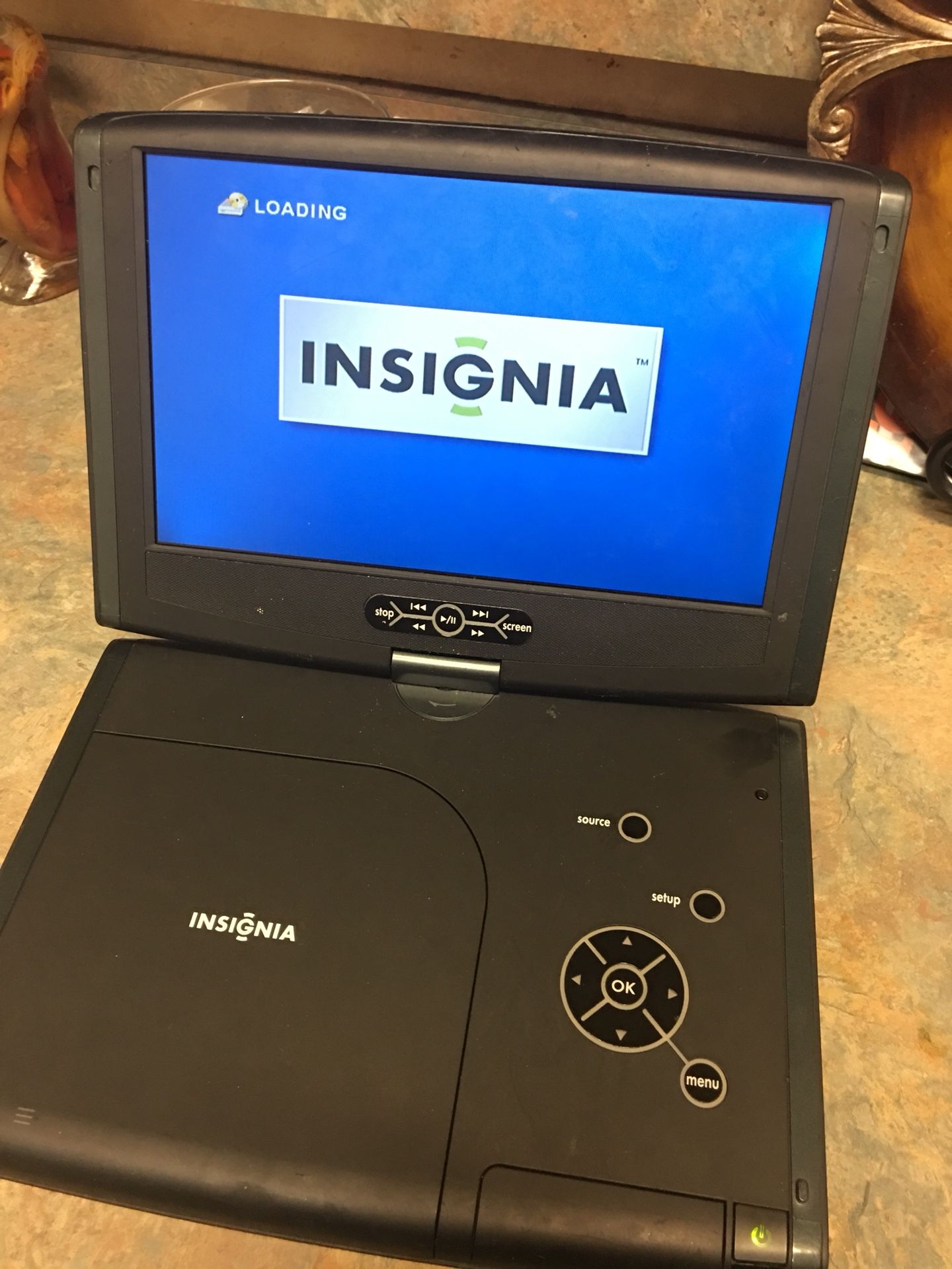 Insignia portable DVD player with remote control and charger $30