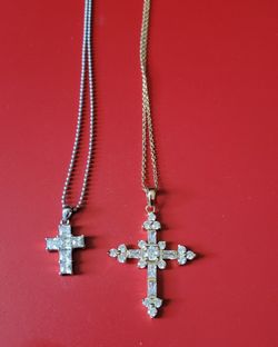 Cross with Rhinestones, you get both, 1 silver & 1 gold