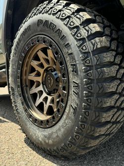 17x9 Wheels And Tires 265/70/17 MT