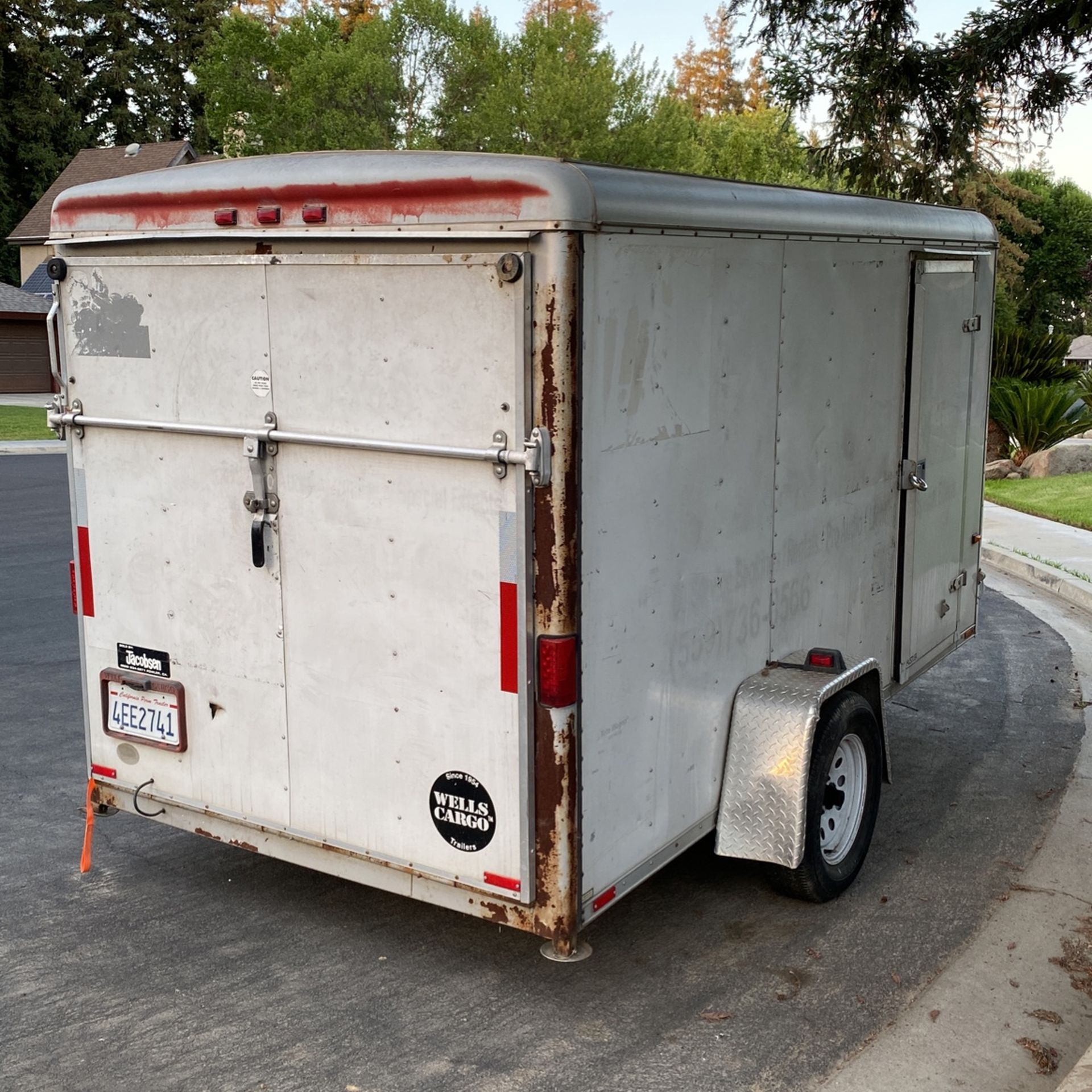 6x12 Wells Cargo Enclosed Trailer With Drop Gate for Sale in Visalia