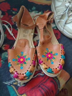 Mexican shoes size mexican is twenty one and size usa is two size two