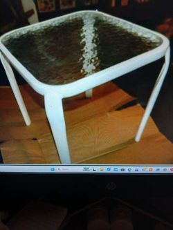 SMALL METAL TABLE WITH GLASS TOP