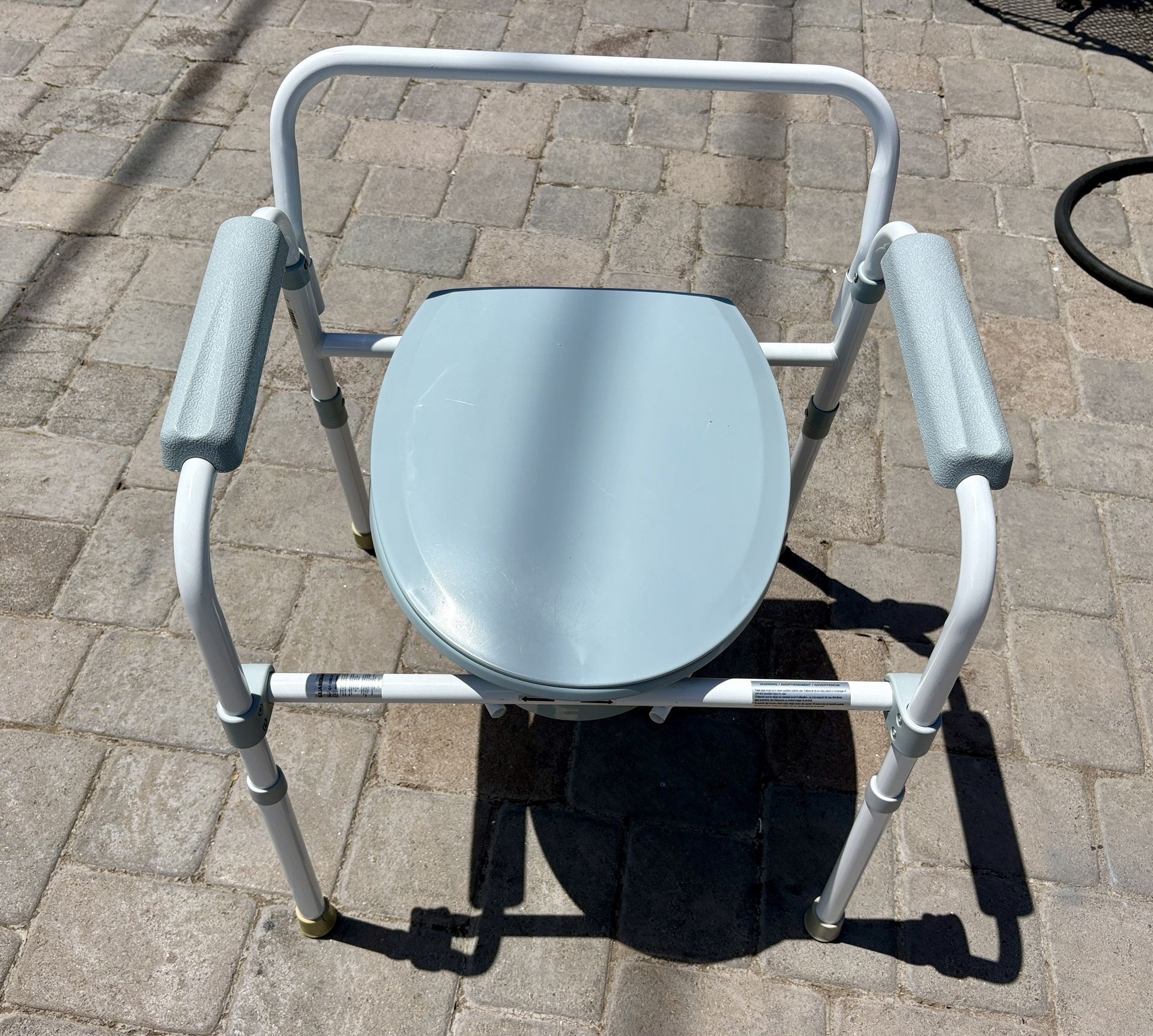 Bedside commode new
