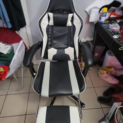 This is a gaming chair.This is just a picture to show what it looks like , but the new one is in the box