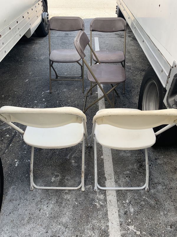 Used white folding chairs for sale for Sale in Tamarac, FL