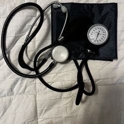 Blood Pressure Cup And Stethoscope 
