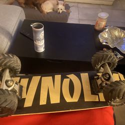 Skateboard With Lifted Trucks And Wheels 