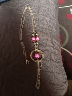 Collar dorado con Rosita bajito