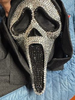 Ghost face mask made of black and silver diamond