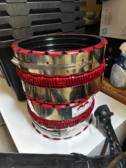 The object in the image is a MAXADAPTOR, a universal shielded coupling 