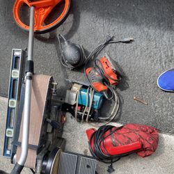 Two Lawnmowers Two Ladders Power Tools