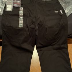 Wolverine Cat 2 FR Stretch Denim work pants. Brand new. Size 38/30. BLACK
