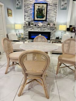 Dining set; 4 chairs with a natural rattan