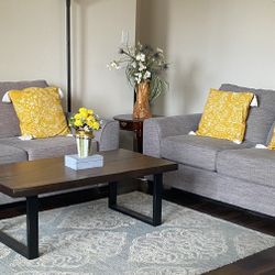 Lightly Used Two Extra Large Love Seats With Light Gray Fabric, Cushions Not Included