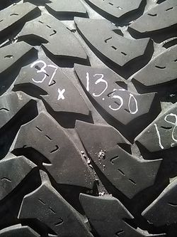 37x13.50 18 two Toyo tires