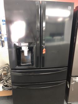New scratch and dent kenmore black French door fridge. 1 year warranty