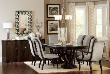 Sophisticated Style large dining set featuring featuring a distinct birdcage style base