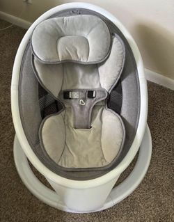Munchkin Lightweight Baby Swing with Natural Sway in White.
