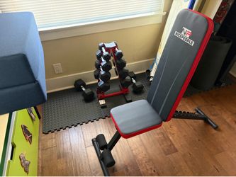 Dumbbells, rack and a bench